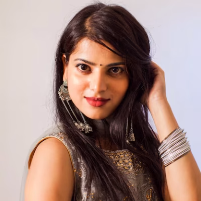 beautiful-indian-woman-slightly-smiling-looking-camera-young-woman-with-beautiful-long-dark-hair-posing-white-background-emphasizing-best-your-identity_290431-22700